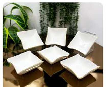 تصویر از کاسه دفرمه لب طلا